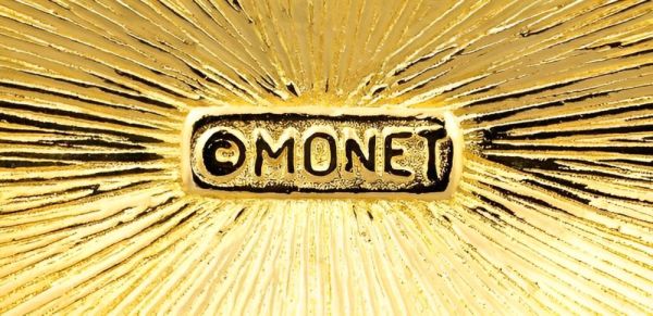 Monet Gold Tone Black Enamel Diamante Brooch circa 1980s