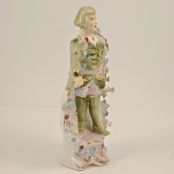 Antique Hand Painted Porcelain Man Figurine with Flowers