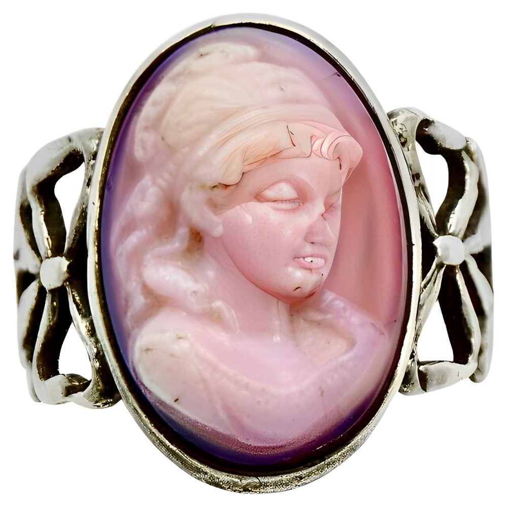 Sterling Silver and Pink Conch Shell Cameo Bow Ring circa 1920s